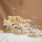 Decorative metal animal figurines with measurements on a brown background