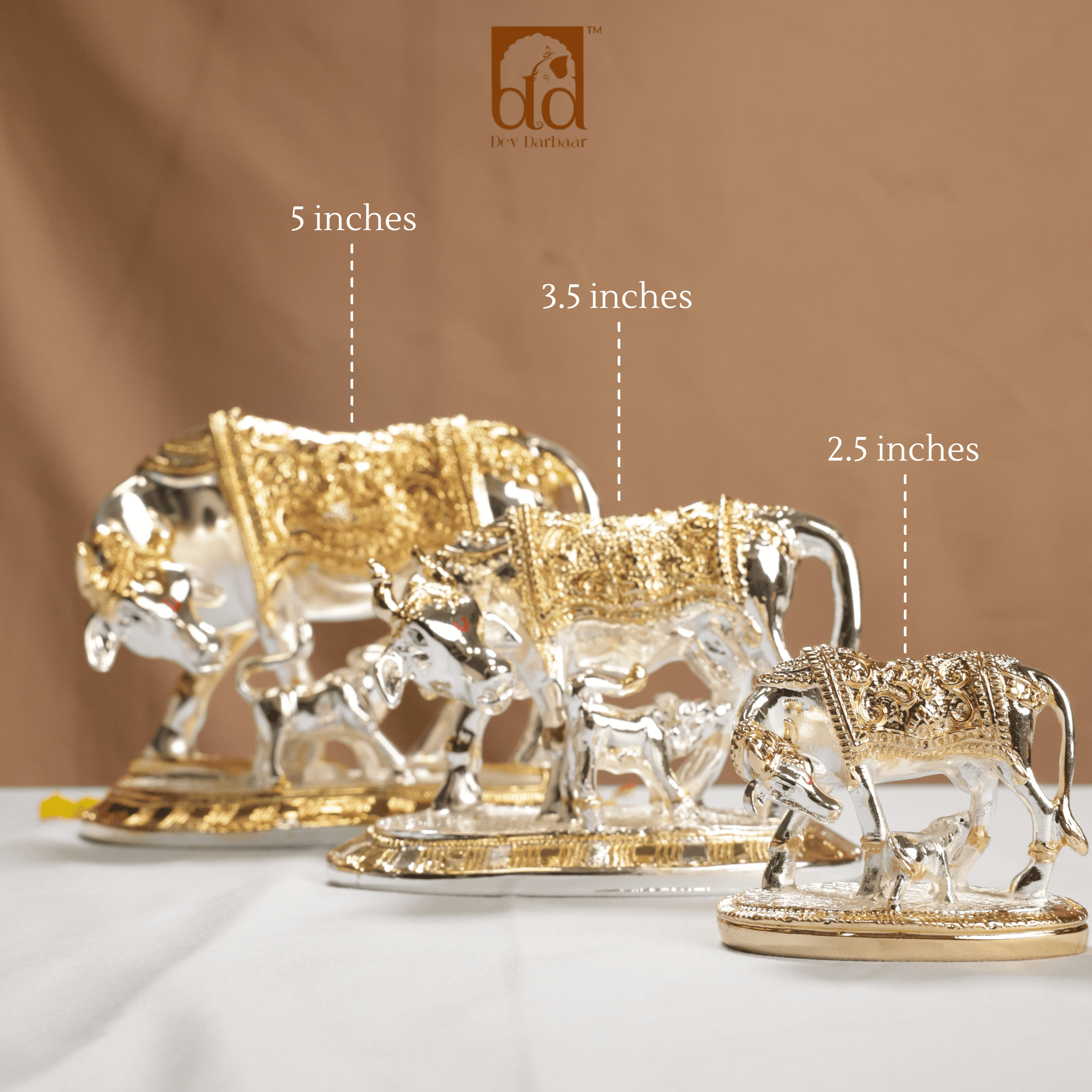 Decorative metal animal figurines with measurements on a brown background